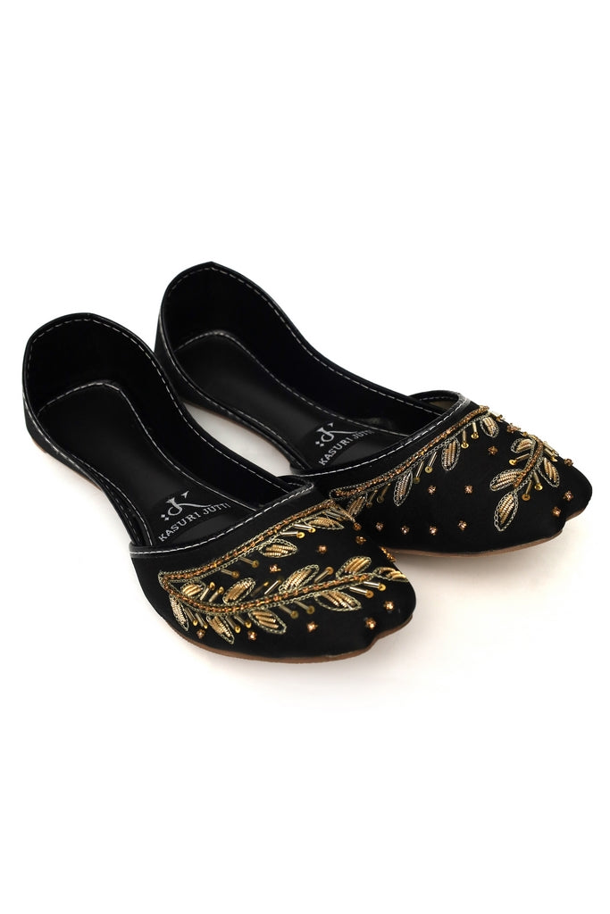 Pair of Onyx Vine Kasuri Jutti in with luxurious golden embroidery