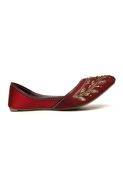 Ruby Ember Kasuri Jutti red shoe with gold work and thread in a side angle