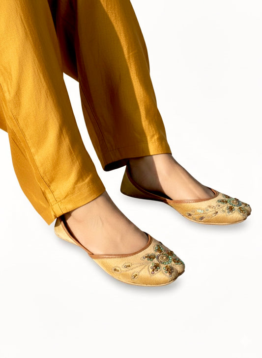 Light golden Kasuri jutti with bead work worn with mustard shalwar