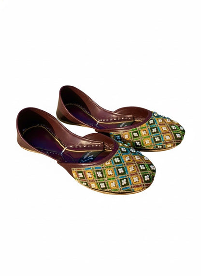 Pair of multi color Kasuri jutti showing beautiful bead work