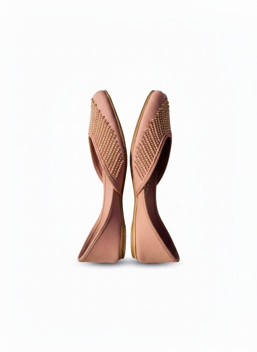 Pink Kasuri jutti pair standing on heels to show shape