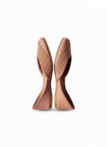 Pink Kasuri jutti pair standing on heels to show shape