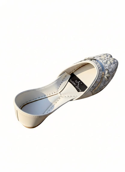 Inside view of white Kasuri jutti with brand label